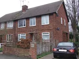 A WELL PRESENTED TWO BEDROOM MAISONETTE SITUATED CLOSE TO THE VILLAGE CENTRE WITH GARDEN AND PARKING