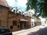 Character terraced property close to village centre.