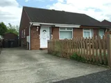 A DELIGHTFUL TWO BEDROOM SEMI-DETACHED BUNGALOW WITH DRIVEWAY & GARDENS